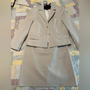 Judith and Charles-light grey skirt and jacket with white detailing trim…
